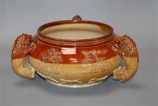 A 19th century Lambeth stoneware bowl, with three lion handles height 12cm